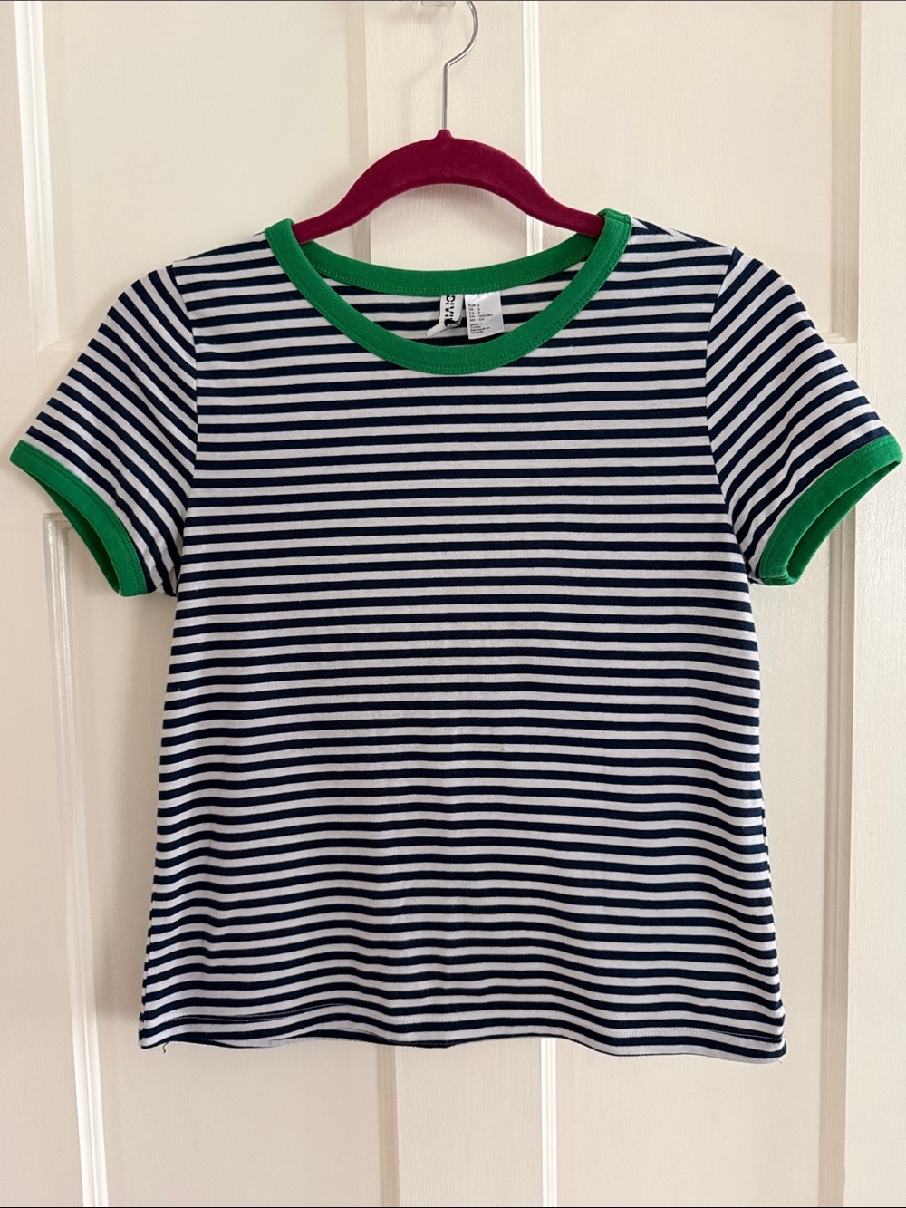 🐸 Divided navy/white striped tee with green accents on sleeves. Size S.